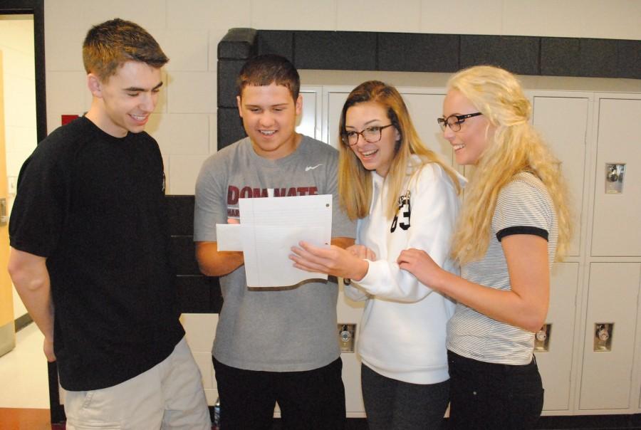 Harlan County High School Link Crew leaders, from left, Cameron Carmical, Rhett Alred, Emma Day and Kali Nolan worked on plans for the program, which will begin during the 2016-2017 school year and is designed to help incoming freshmen adapt to high school by working with older students.