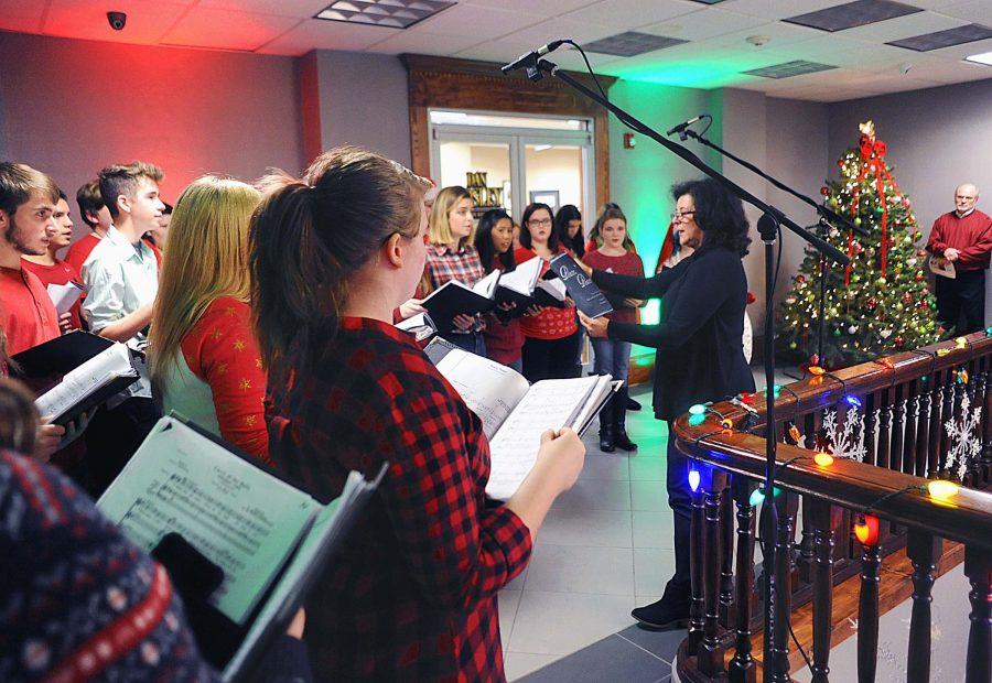 The annual Harlan County Courthouse caroling program was held Tuesday evening as groups took part in the event sponsored by the Harlan County Fiscal Court, courthouse staff and the Harlan Arts Council. One of the many groups to liven up the cold night was the Harlan County High School Choir, under the direction of Jeanne Lee.