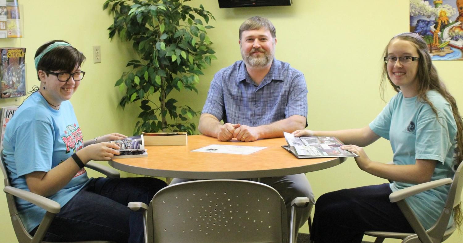 Summer Reading 2017 will open Thursday at the Harlan Public Library. Cheyenne Coogle (left) and Casey Ledford talked with Harlan Public Library director Richard Haynes about plans for this year’s program.