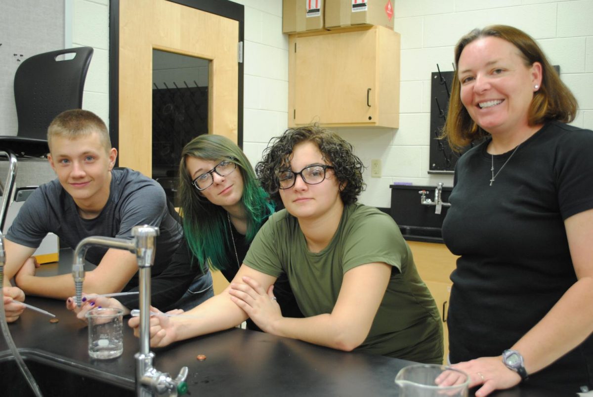 Shaun Warren, Lindsey Fields and Malia Williams were among the participants in a science project led by Harlan County High School teacher Jennifer Hilton. 