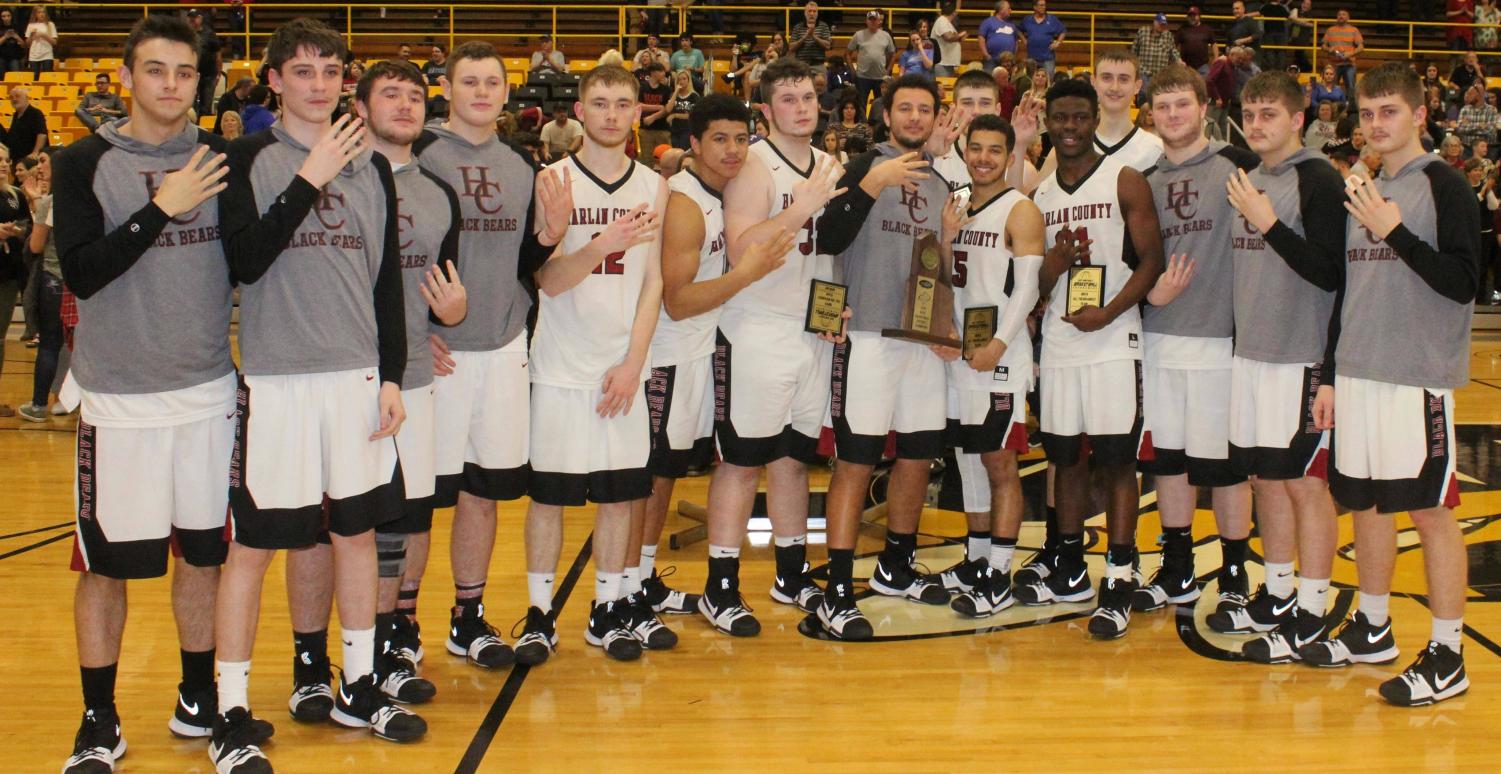 The Harlan County Black Bears celebrated their fourth straight 52nd District Tournament title after edging Harlan 46-43 on Friday.