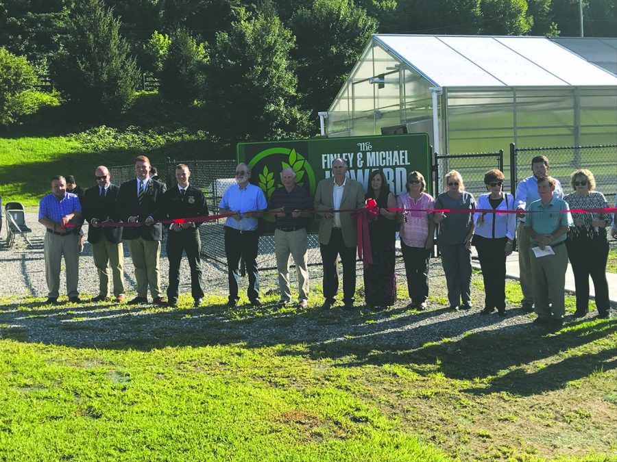 A ribbon-cutting ceremony was held last week at Harlan County High School to mark the opening of “The Finley & Michael Howard Agricultural Learning Center” on the campus of the school. 