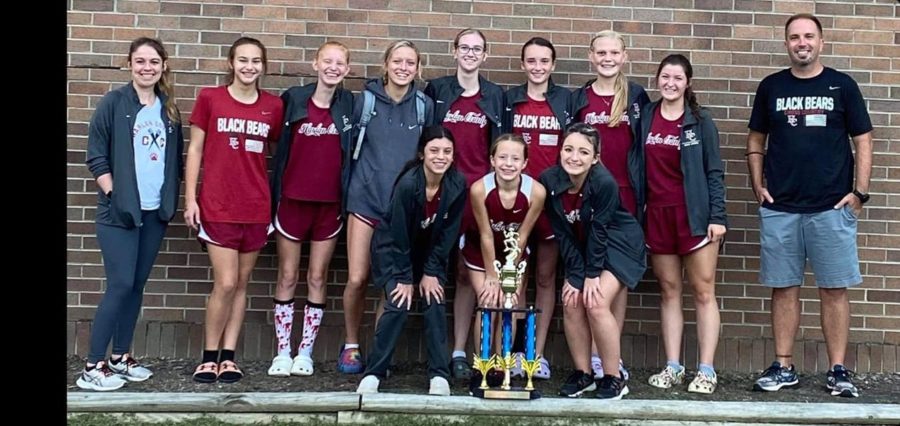 The+Harlan+County+girls+won+the+Southeastern+Kentucky+Conference+meet+on+Tuesday+at+Bell+County+High+School.+Team+members+include%2C+from+left%2C+front+row%3A+Aliyah+Deleon%2C+Kendall+Brock+and+Lainey+Garrett%3B+back+row%3A+assistant+coach+Miranda+Epperson%2C+Taylor+Clem%2C+Summer+Farley%2C+Peyton+Lunsford%2C+Olivia+Kelly%2C+Sophie+Day%2C+Leah+Taulbee+and+Riley+Key.
