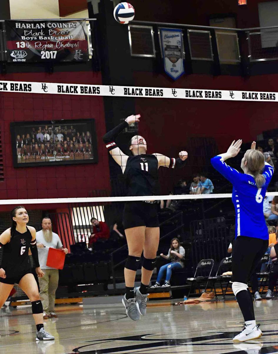 Harlan County junior Kylee Hoiska went up for one of her 16 kills in the Lady Bears' thrilling five-set win over visiting Bell County.