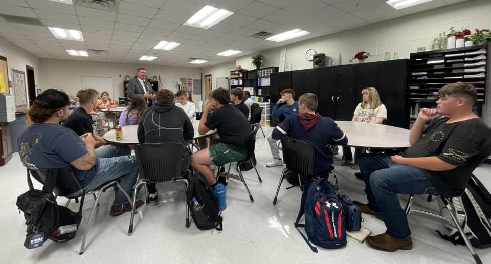 Members of the Harlan County High School student council recently met with Harlan County Schools Superintendent Brent Roark.