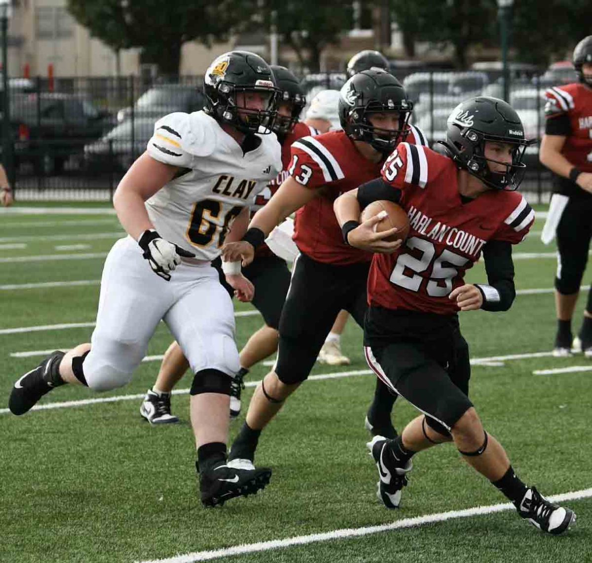 Harlan County quarterback Brayden Morris slashed through the Clay County defense in Saturday’s game. Morris passed for two touchdowns in the Bears’ 21-0 win.